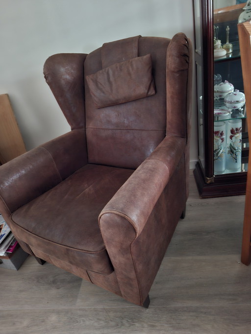 2 fauteuils en cuir brut marron