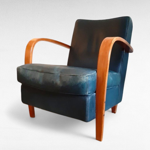 Fauteuil Baxter design italien, cuir vert pétrole