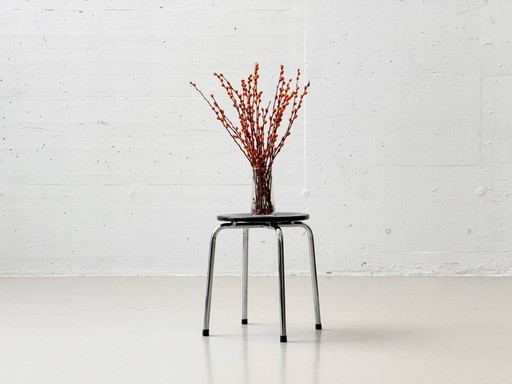 Stool with chrome frame and wooden seat by Zingg-Lamprecht, 1970s