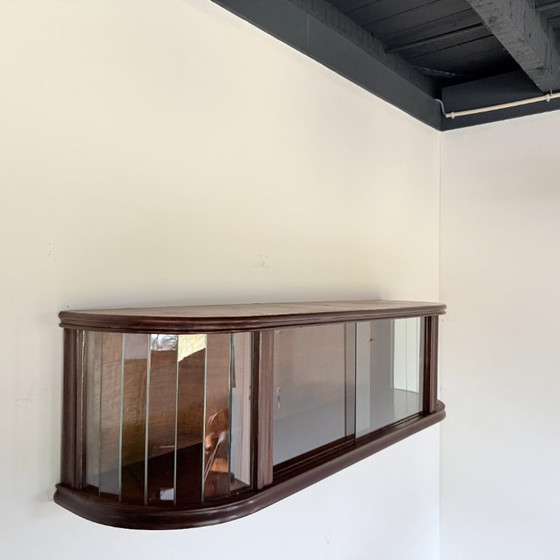 Image 1 of Subtle hanging display case with polished slats