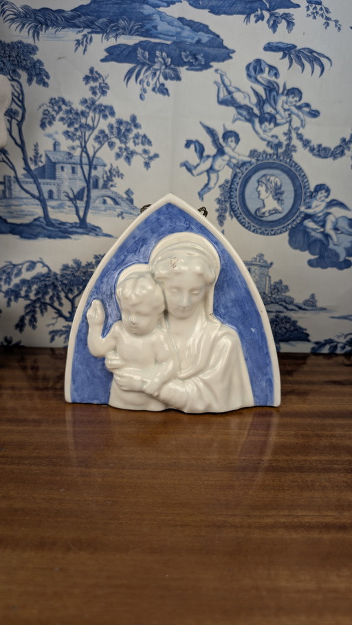 Bas-relief of the Madonna and Child in Majolica in the taste of Della Robbia