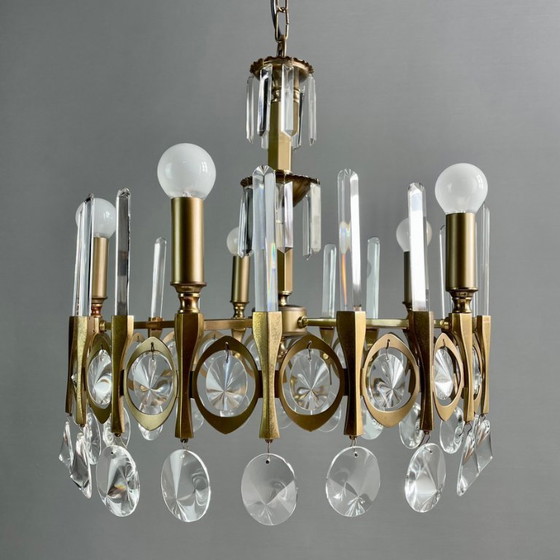 Image 1 of Gaetano Sciolari, five-light chandelier from the "Ovali" series, 1960s. Burnished brass frame and original optical crystals.