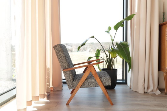 Image 1 of Loungestoel zwart granola mid-century modern design