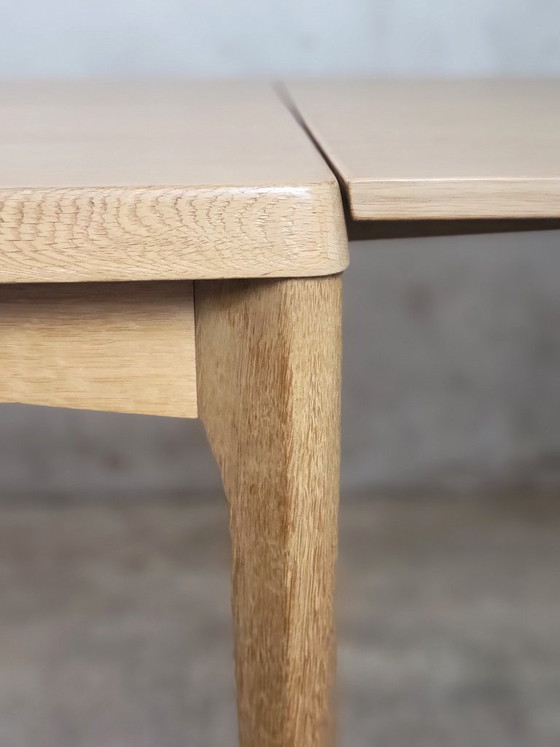 Image 1 of Vintage oak dining table by Henning Kjaernulf for Vejle