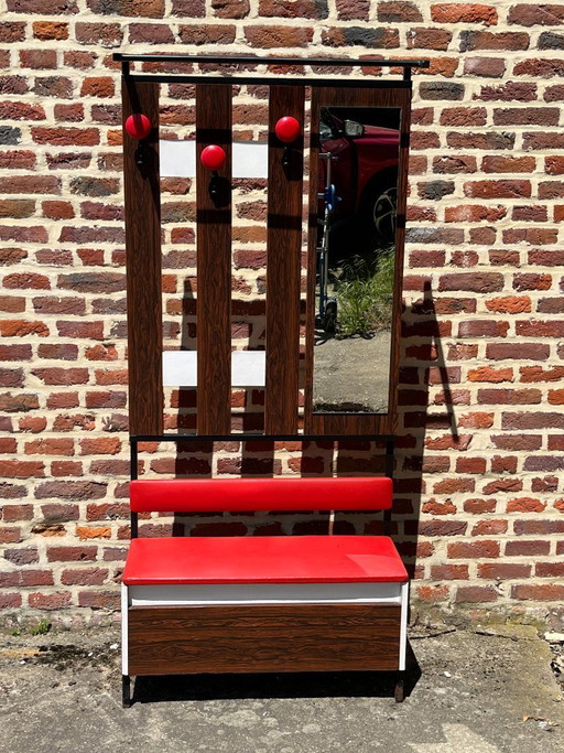 Vintage entryway cloakroom with bench and mirror