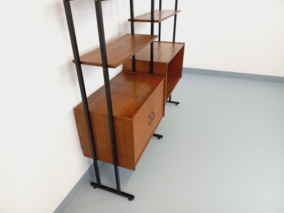 Image 1 of Vintage Italian double modular bookcase in teak and metal from the 1960s