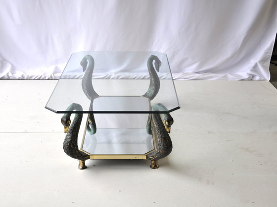 Image 1 of Vintage glazen salontafel met sculpturaal zwanenframe en glazen blad