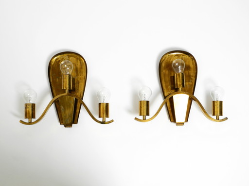 Pair of large heavy Mid Century brass wall lights from a German church