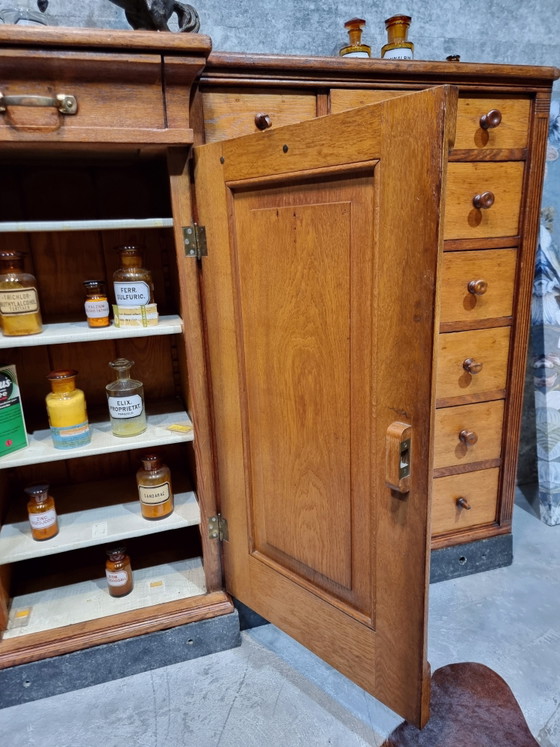 Image 1 of Apothekerskasten antique vintage artdeco originele eiken kasten uit apotheken