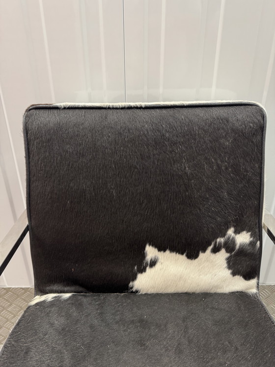 Image 1 of Silla de diseño de lujo en aluminio cromado con piel de vaca auténtica.