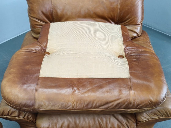 Image 1 of Een paar Arcon Italia loungefauteuils van cognacbruin buffelleer.