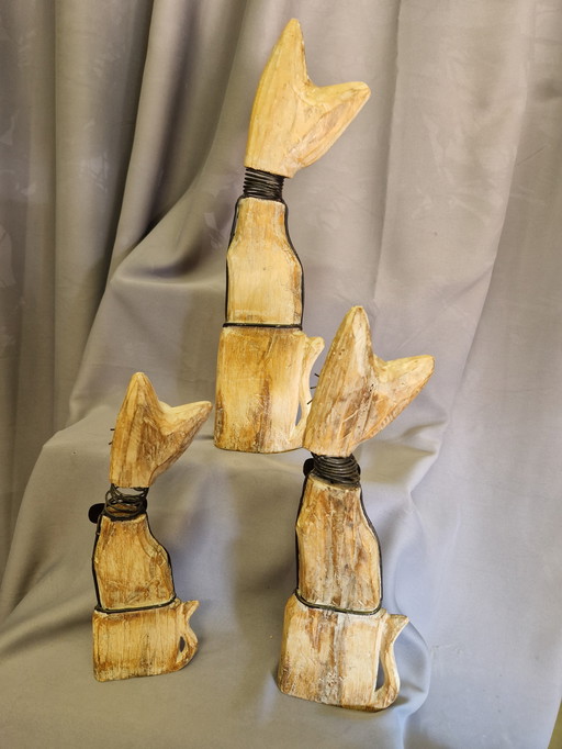 3 wooden cats