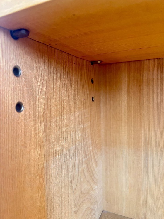 Image 1 of Mid - Century tapered bookcase with brass shoes. Very high quality design piece from the 50s/60s.
