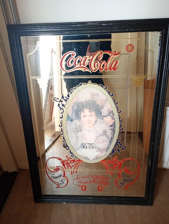 Image 1 of Espejo antiguo de Coca-Cola de más de 50 años.