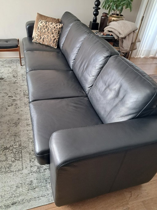 Beautiful black leather 4-seater sofa