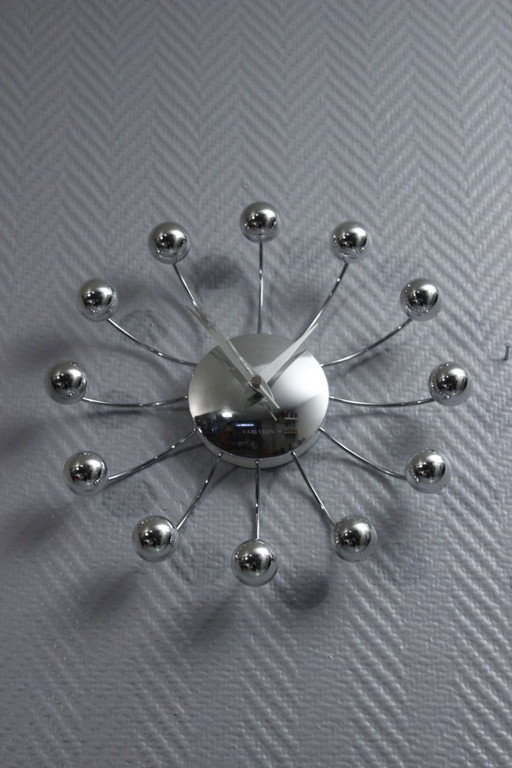 Horloge pendule murale vintage Karlsson Spider Clock design Sputnik chrome