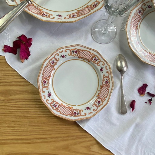 Antique Limoges porcelain dessert service by A. Lanternier & Cie, comprising 10 plates and a cake stand