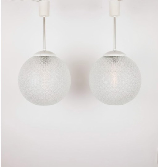 Set of 2 identical glass Mid-Century pendant lamps, Poland 1960s
