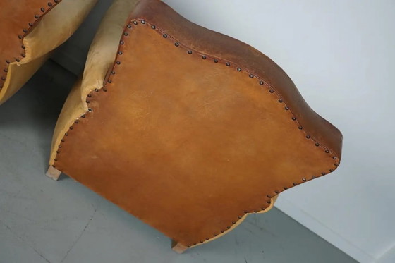 Image 1 of Coppia di poltrone da club francesi in pelle color cognac con schienali a baffo, anni '40