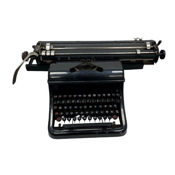 Image 1 of Antique Olympia M10 wide carriage typewriter from the 1930s/40s.
