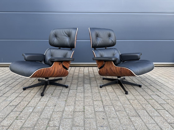 Image 1 of 2 poltrone lounge Vitra Eames XL originali con poggiapiedi, in pregiata pelle nera e palissandro Santos, NUOVE!!