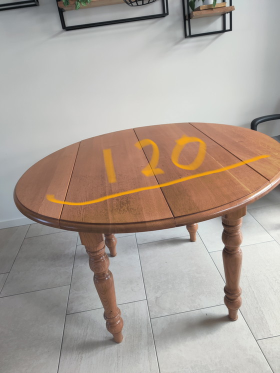 Image 1 of In large adjustable oak table