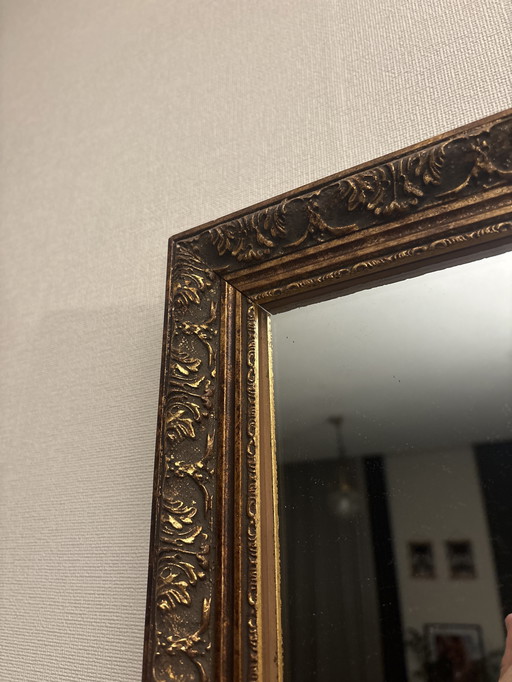 Miroir ancien à cadre doré