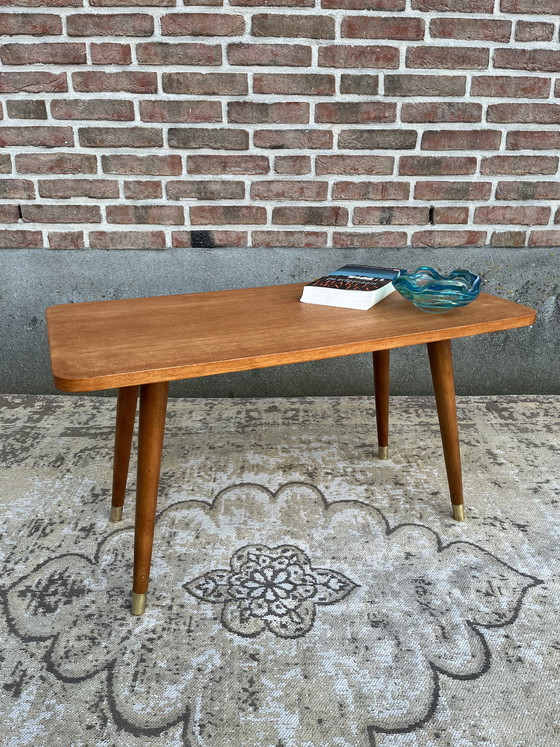 Image 1 of Vintage mid-century Danish coffee table on beautiful tapered legs with brass caps