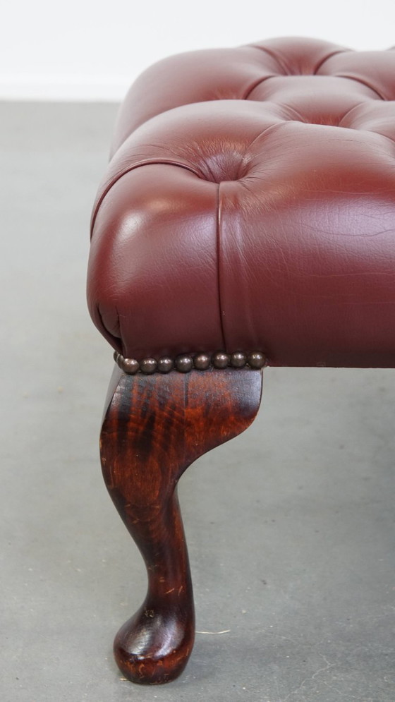 Image 1 of Elegant red/brown Chesterfield stool in very good condition