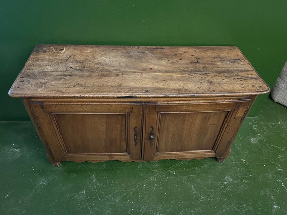 Image 1 of A very small rustic walnut sideboard