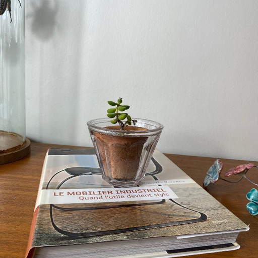 Antique conical-shaped glass jam jar with facets