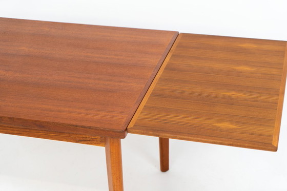 Image 1 of Table de salle à manger à rallonge de Henning Kjaernulf pour Vejle Møbelfabrik (Danemark, années 1960).