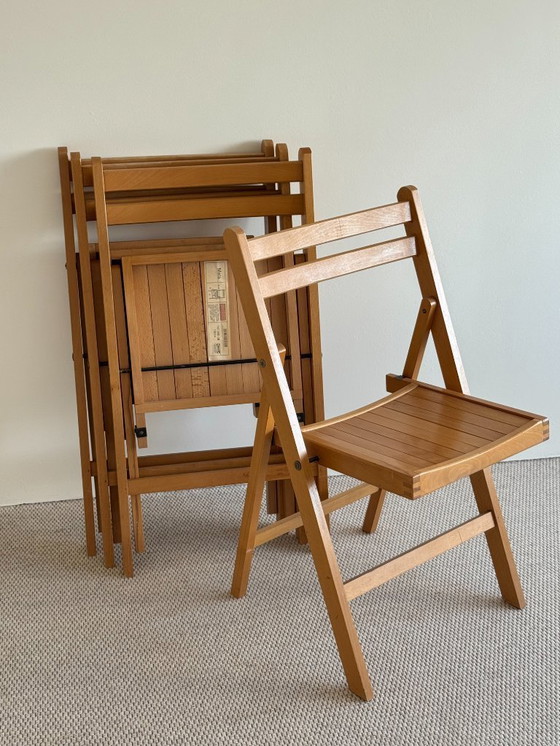 Image 1 of set / 4 vintage IKEA houten klapstoelen