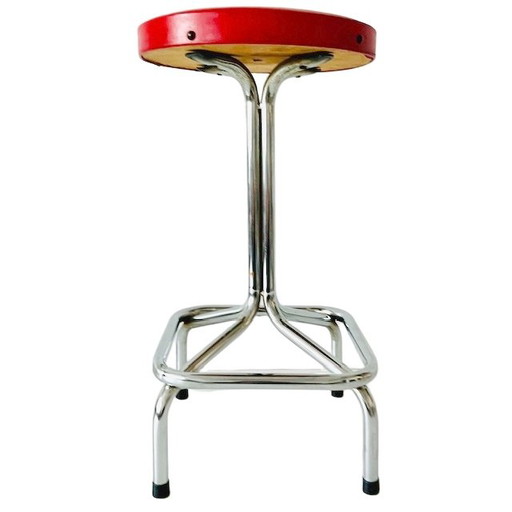 Tabouret vintage à structure tubulaire chrome rouge