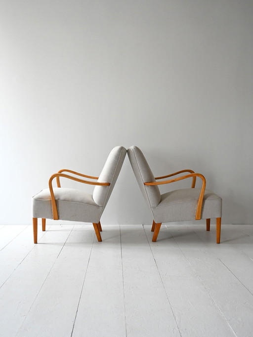 Paire de fauteuils scandinaves en teck des années 1950