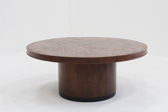 Image 1 of Vintage brutalist round coffee table in copper and wood from the 1970s