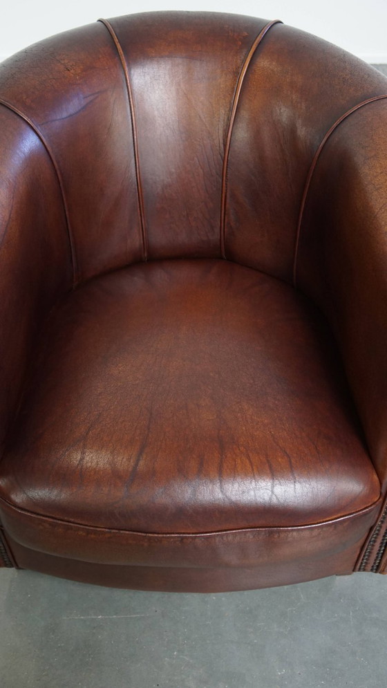 Image 1 of Sheep Leather Club Chair in a Dark Cognac Color