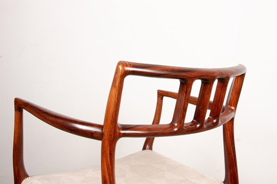 Image 1 of Fauteuil Danois en Palissandre et tissu, modèle 64 par Niels Otto Moller pour Moller’s Mobelfabrik 1960.