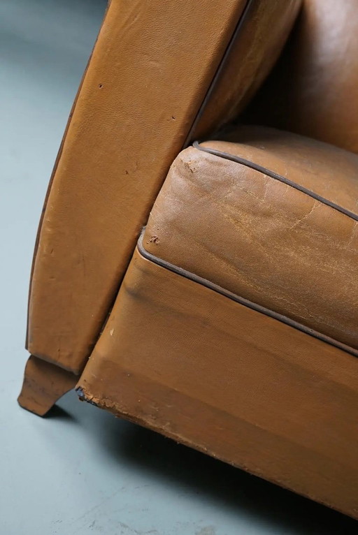 Conjunto de sillones de club franceses vintage de cuero color coñac, años 50