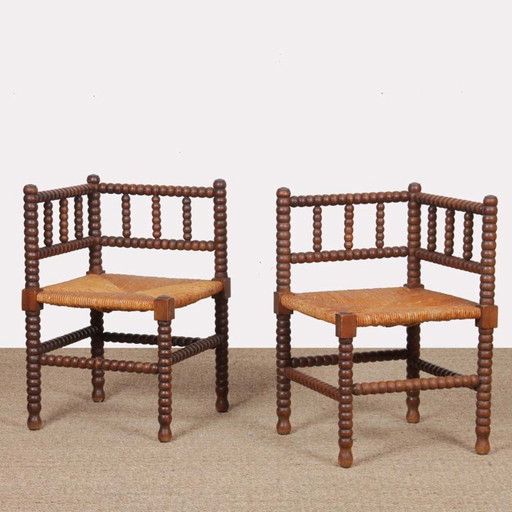 Pair of small turned wood corner chairs with straw seats, 1940