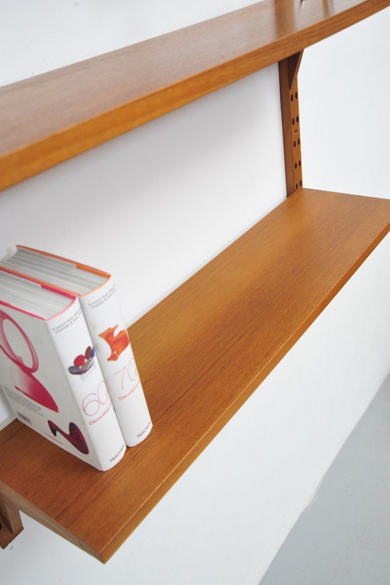 Image 1 of "Royal System" wall shelf made of teak by Poul Cadovius for CADO (1950s)
