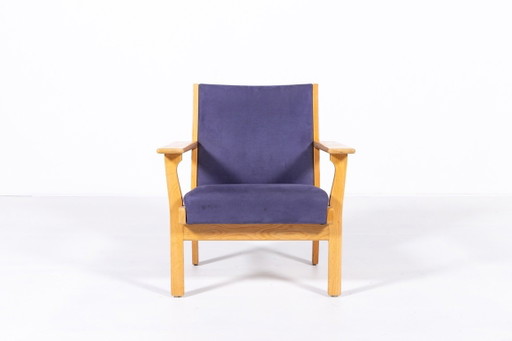 Poltrona di design scandinavo disegnata da Hans Wegner per Getama, Danimarca, anni '80.