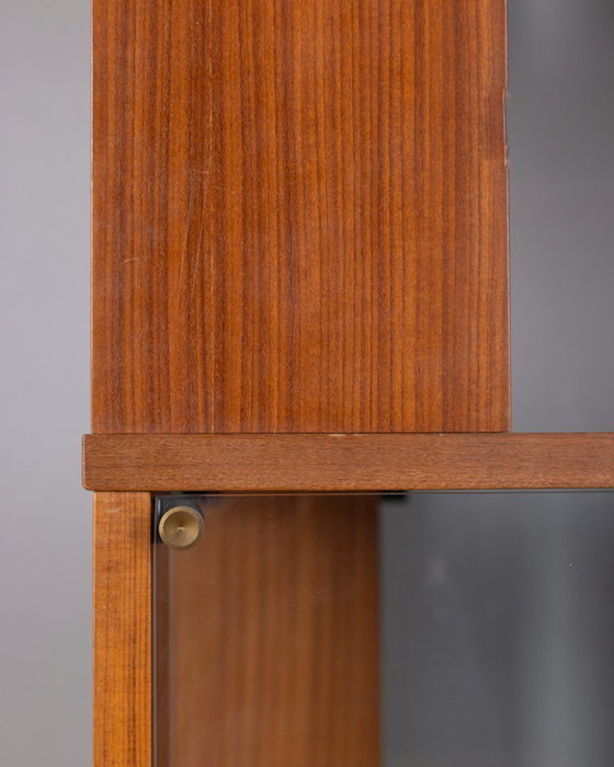 Image 1 of GROTE VINTAGE ITALIAANSE ONTWERP HOUTEN CENTRALE DRAAIBARE BOEKENKAST UIT DE JAREN 60