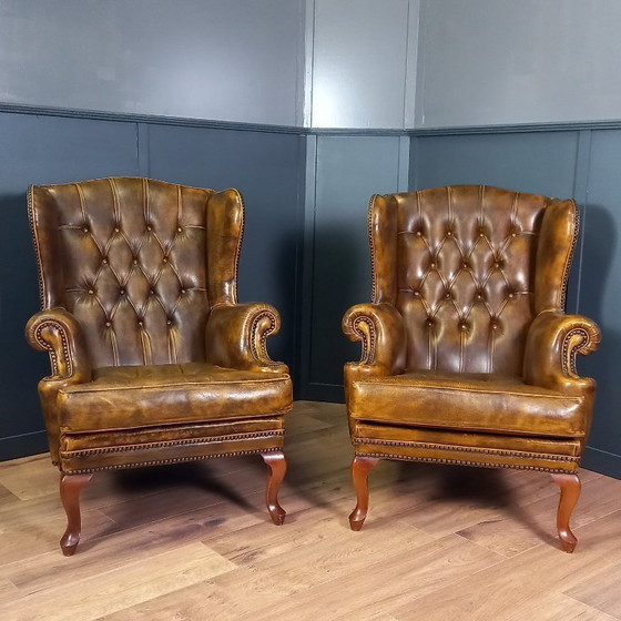 Image 1 of een Set van twee cognac kleurige Vintage chesterfield fauteuils