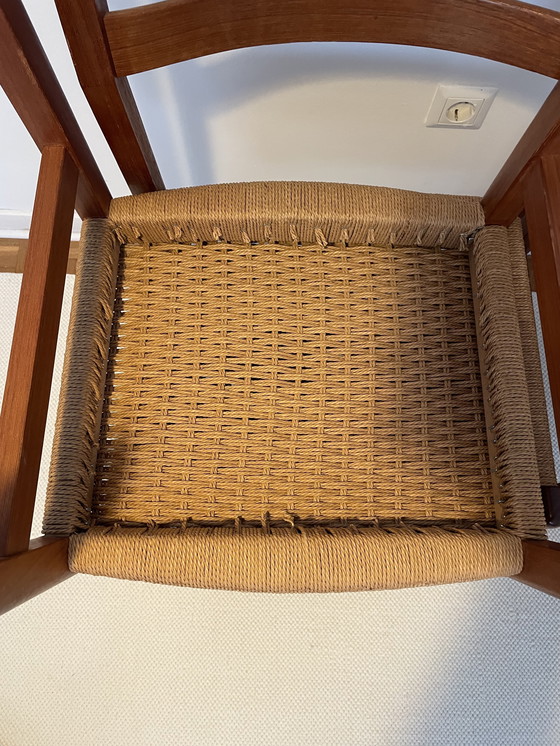 Image 1 of 4 stoelen in mid-century stijl uit de jaren 60, gemaakt van teakhout en riet.