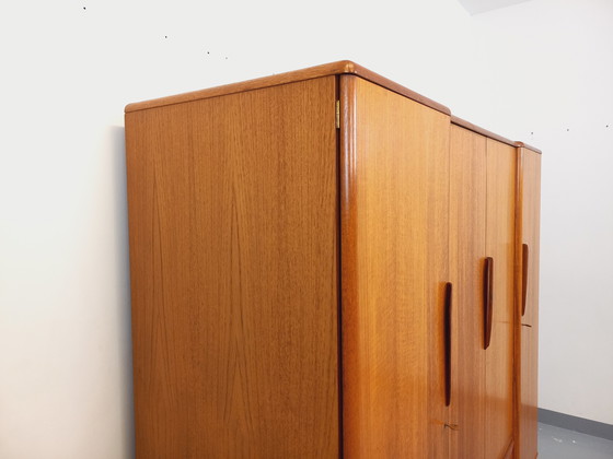 Image 1 of Scandinavische vintage kledingkast in teakhout uit de jaren 60 van ontwerpers Tricoire en Vecchione voor "Meubles TV Paris".