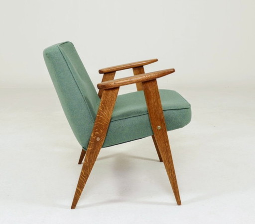 Fauteuil scandinave en laine verte naturelle et bois rustique de chêne