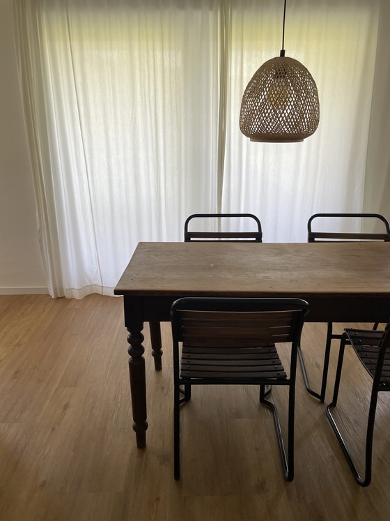 Image 1 of Solid wood dining table + 4 chairs - vintage / industrial style