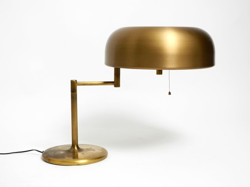 Extraordinary heavy 1960s XXL brass table lamp by Staff with a swivel joint