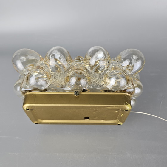 Image 1 of Vintage glass bubble wall lamp by Glashutte Limburg. Design by Helena Tynell. Glass and brass. 1960, Germany.